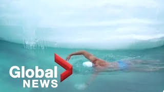 Swimmer plunges through Antarctica's waters for climate change awareness