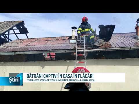 batrani captivi in casa in flacari