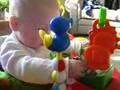 Alex Playing On His Exersaucer