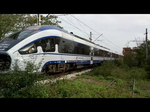 A New Intercity Rake of PKP emerges from the Bridge.  Wroclaw, Poland 17/09/2019