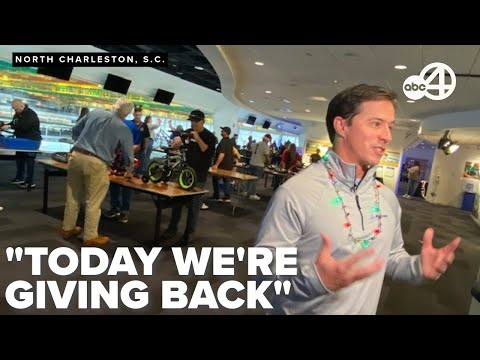 Boeing workers swap jumbo jets for bicycles to spread holiday cheer to local children