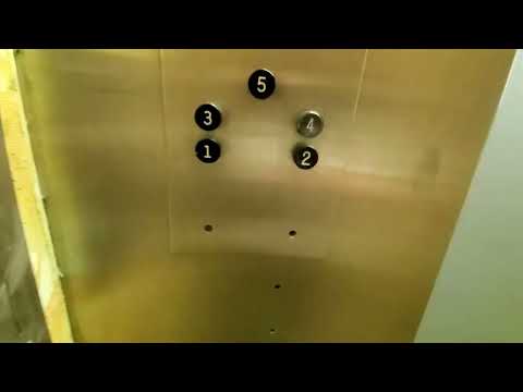 1963 Otis Black Button Swing Door Elevator at Valli Hi Apartments in Salt Lake City, UT