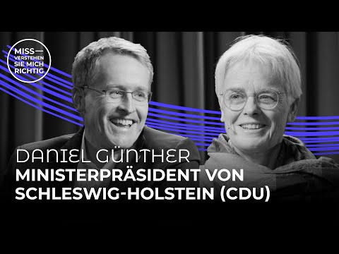 Ulrike Herrmann im Gespräch mit Ministerpräsident Daniel Günther