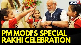 Raksha Bandhan 2023: Watch School Girls Tie Rakhi To PM Modi In Delhi | PM Modi News | News18