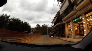 Driving through Kalavryta on a mountain road at dusk, Greece - onboard camera