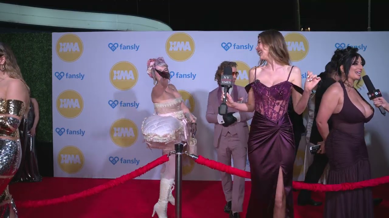 Ellie James interviews Susie Q and Mike at XMAAwardsLA on the red carpet