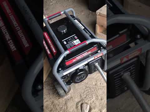 Installing an exhaust pipe on a Benchmark 11,500 Generator
