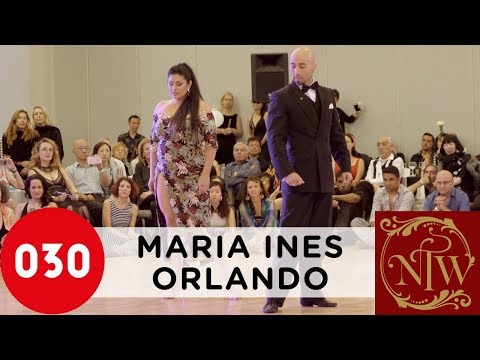  Maria Ines Bogado  and  Orlando Reyes  are  dancing  to  the  tango  "  El Adios  "  by  Osvaldo Pugliese  at  Nora's Tango Week  in  2019