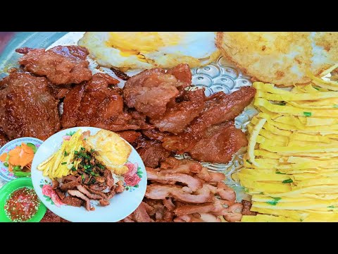 Cambodian breakfast, fried pork with rice recipe, rice with pork and eggs.