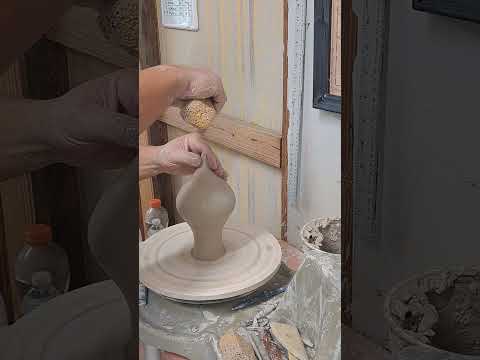 Throwing and sculpting a Seashell from clay.