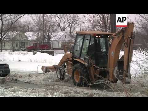 Flooding from water main break inundates streets in several-block area of Detroit. Such breaks have
