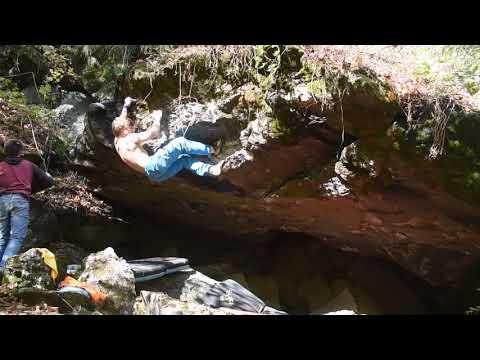 Rumney Bouldering: "Laws of Gravity" V9