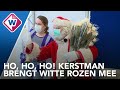 'Kerstman' Henny krijgt zijn boosterprik en brengt rozen mee voor GGD-medewerkers - OMROEP WEST