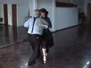  Carlos Perez  and  Juliana Maggioli  are  dancing  to  the  tango  "  Recuerdo  "