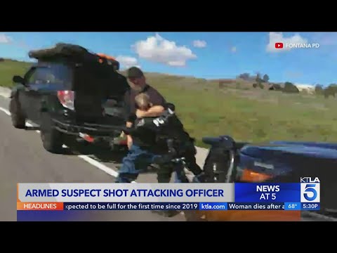 Armed suspect shot while attacking officer