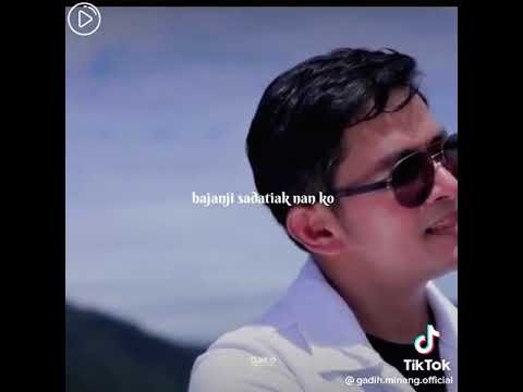 Jaisky feat Fauzana.                        Nyao Taruhan Cinto