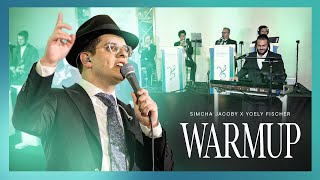 Warmup – Simcha Jacoby & Yoely Fischer – שמחה יעקבי & יואלי פישער (הזמר והיוצר שמחה יעקבי) - התמונה מוצגת ישירות מתוך אתר האינטרנט יוטיוב. זכויות היוצרים בתמונה שייכות ליוצרה. קישור קרדיט למקור התוכן נמצא בתוך דף הסרטון