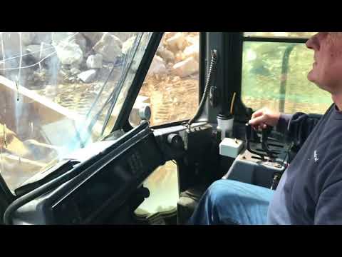 Caterpillar 988F Wheel Loader Loading Komatsu Dumpers - Operator View