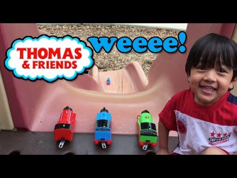 Ryan plays with Thomas and friends toy trains at the Playground Video