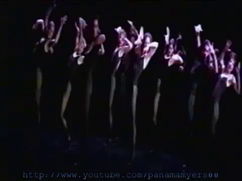 TV commercial still: rapid tap flurries from the 'Sing, Sing, Sing' finale