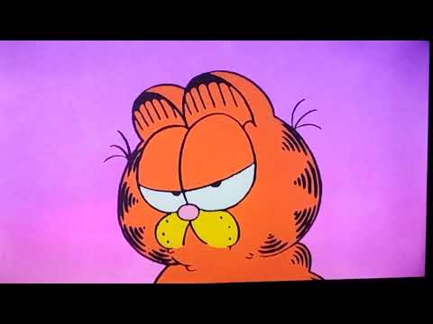 Jon Arbuckle finds Garfield up a Tree/ends up being Stuck up the Tree