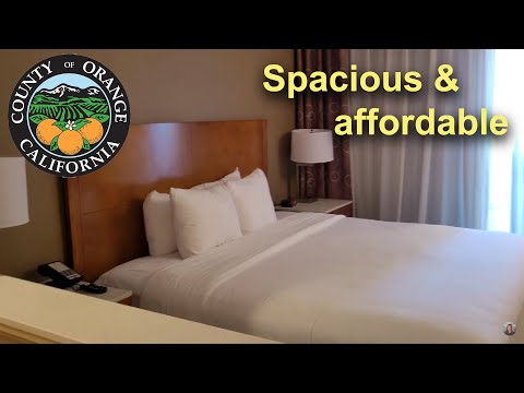 Staying at Mainstay Suite Hotel Walkthrough - Orange County (king bed in a spacious hotel)