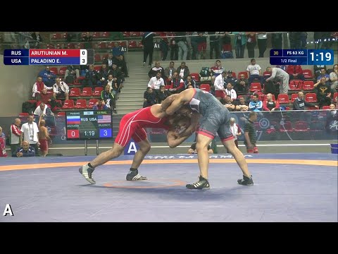 1/2 FS - 63 kg: M. ARUTIUNIAN (RUS) df. E. PALADINO (USA), 4-3