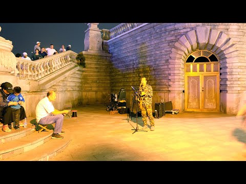 Listen to a saxophone music beside Bei 'an Bridge  北安桥边听一首萨克斯风曲《追捕》