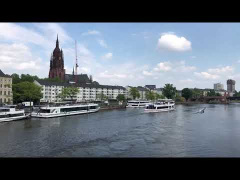 View of Frankfurt above the Rhine River on Untermainbrucke Bridge. May03, 2018.