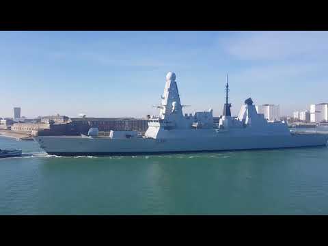 Hms Defender sailing out of HMNB Portsmouth