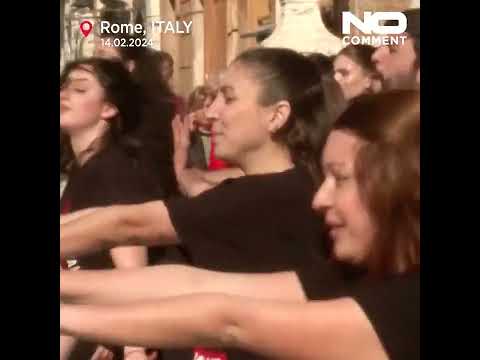 Dozens of activists gathered for a flash mob against gender violence in Rome