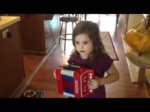 Sophia playing the accordion