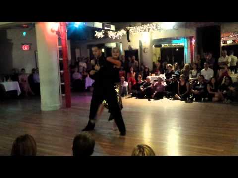  Michael Nadtochi  and  Eleonora Kalganova  are  dancing  to  a  tango