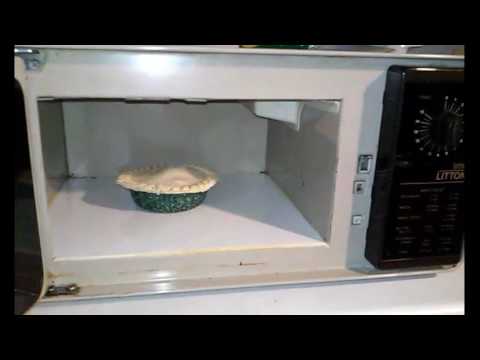 Cooking a chicken pot pie in a 1980s microwave
