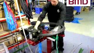 Bicycle wheel tire fitter