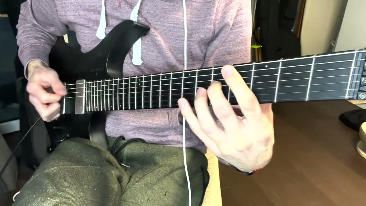Roberto Barlocci playing an octave riff on electric guitar