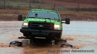 preview picture of video 'MEGA MONSTER TRUCK - GOES DEEP - 8 FOOT+ WATER HOLE'