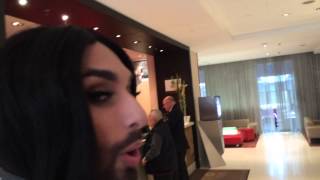 Conchita wearing the Love/Respect scarf