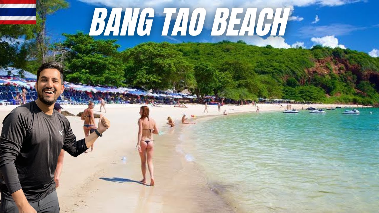 Immerse yourself in the enchanting beauty of Bang Tao Beach through the lens of tourists.