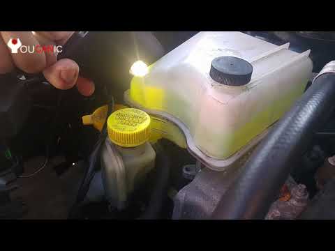 Air Bubbles in Coolant Reservoir due to a Blown Head Gasket