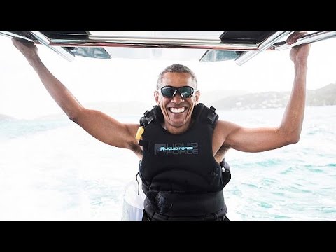 أوباما يتعلم التزلج الشراعي على الماء برفقة برانسون