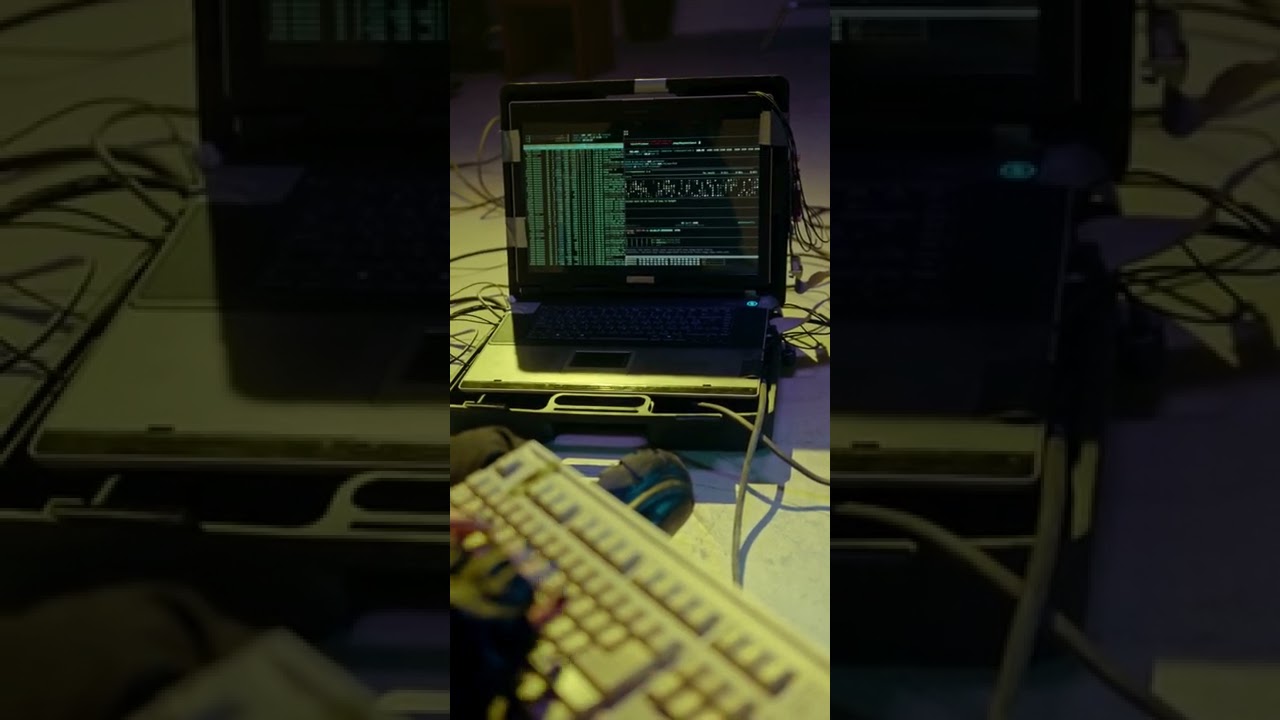 FREE STOCK VIDEO - 4K - Hacker Entering Codes to a Computer Laptop