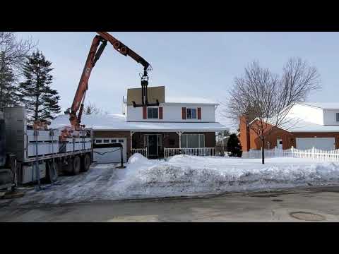Getting drywall to the second floor the smart way.