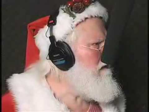Santa behind the mic by Dailey and Associates