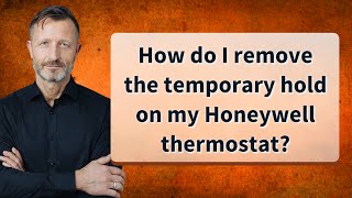How do I remove the temporary hold on my Honeywell thermostat?