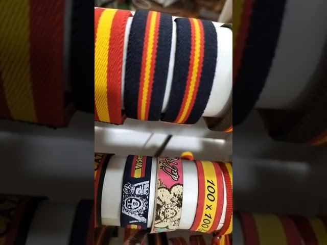 Vídeo relacionado con BDM Pulsera de mujer y hombre de tela azul marico con la Virgen del Pilar y la bandera de España.