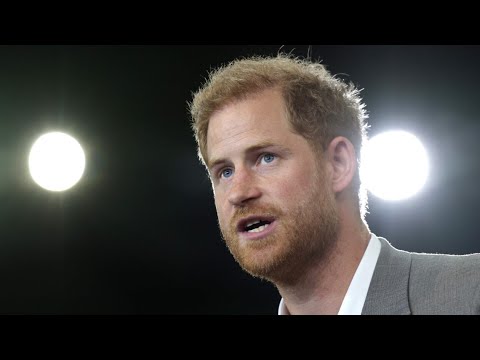 Prince Harry under fire for wearing medals during army award presentation