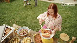 Nathan's Famous Woman bumps into a talking hotdog