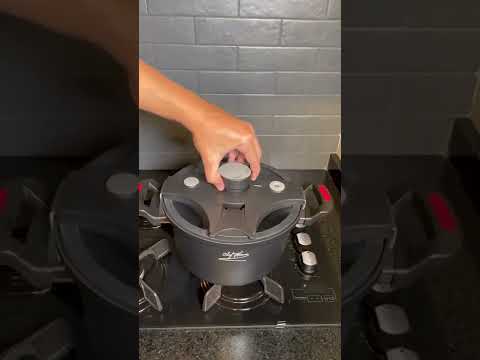 THE REVOLUTIONARY PRESSURE COOKER