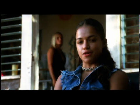 Blue Crush trailer frame: underwater training shot with weights